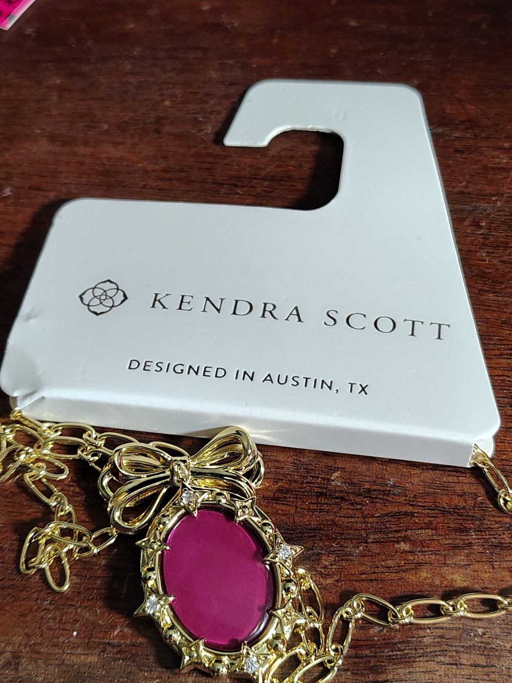 Kendra Scott Gold-Tone Necklace with Magenta Oval Pendant and Bow